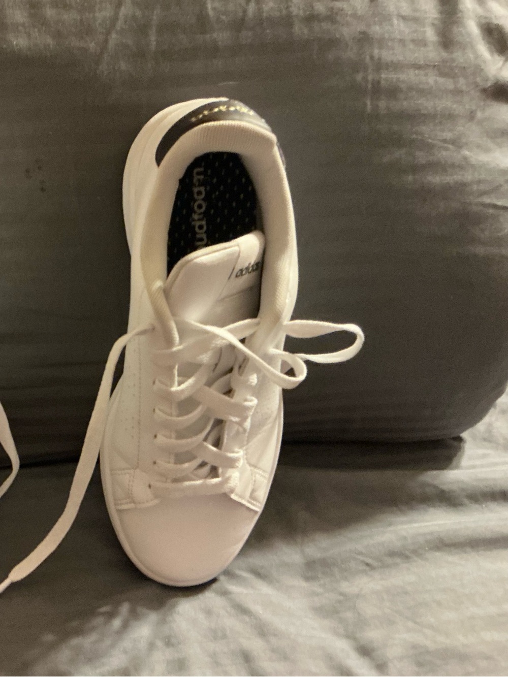 Nike White Low-Top Sneaker with Black Heel Accent